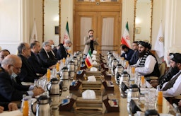 Iran's foreign minister hosts a delegation led by the Taliban caretaker foreign minister in Tehran, Iran on Jan. 8, 2022. (Photo via Iranian MFA)