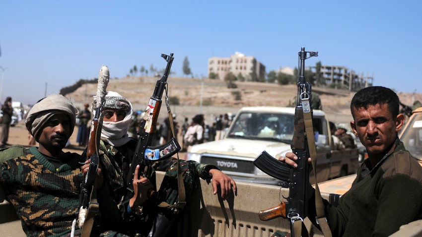 Houthi fighters ride a vehicle in Sana’a Governorate, Yemen on Nov. 16, 2017. (Photo via Getty Images)