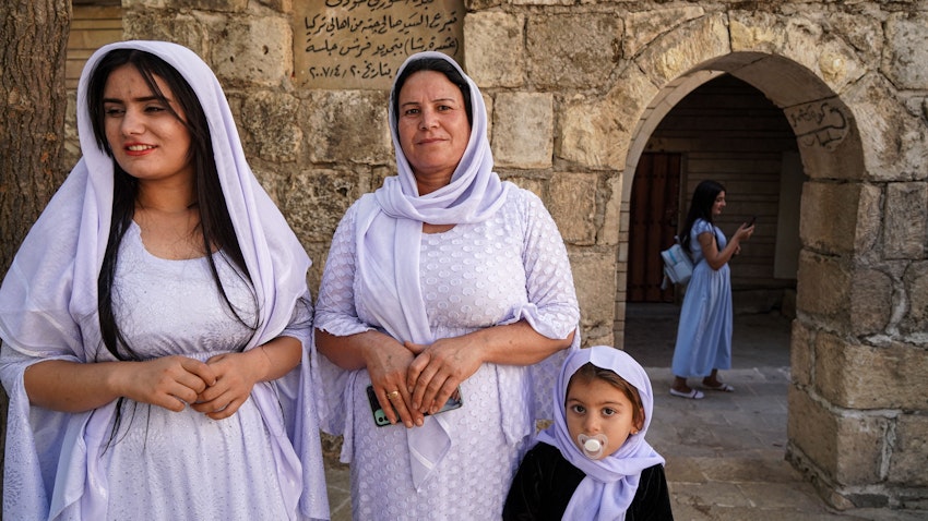 Yazidi women stand at the Temple of Lalish near the city of Dohuk, Iraq on Oct. 7, 2021. (Photo via Getty Images)