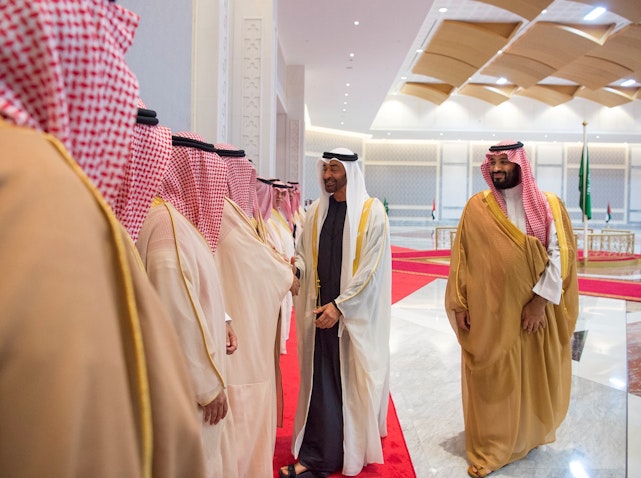 Saudi Crown Prince Mohammed bin Salman Al Saud is welcomed by Emirati Crown Prince Mohammed bin Zayed Al Nahyan in Abu Dhabi, UAE on Nov. 22, 2018. (Photo via Getty Images)