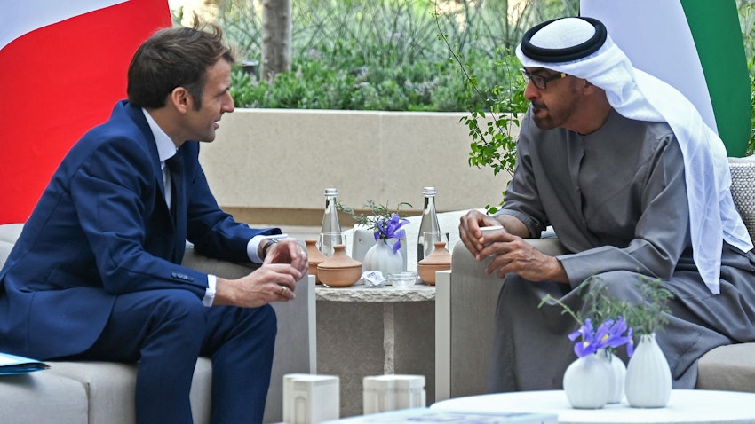 French President Emmanuel Macron and then-Crown Prince of Abu Dhabi Mohammed bin Zayed Al Nahyan in Dubai, United Arab Emirates on Dec. 3, 2021. (Photo via Getty Images)