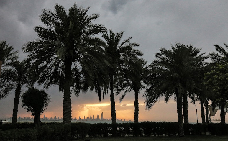 A sunset view of Kuwait City skyline on May 2, 2021. (Photo via Getty Images)