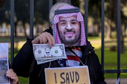 Protesters gather to voice their opposition to alleged Saudi  human rights abuses in Rome, Italy on Jan. 16, 2019. (Photo via Getty Images)