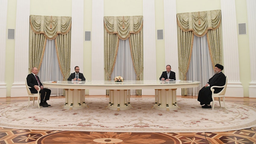Russian President Vladimir Putin and Iranian President Ebrahim Raisi meet in Moscow on Jan. 19, 2022. (Photo via Iran's president's website)