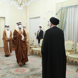 Iranian President Ebrahim Raisi welcomes an Emirati delegation in Tehran on Dec. 6, 2021. (Photo via Iranian presidency)