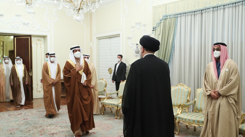 Iranian President Ebrahim Raisi welcomes an Emirati delegation in Tehran on Dec. 6, 2021. (Photo via Iranian presidency)