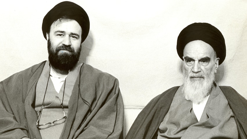 Ahmad Khomeini next to his father Ayatollah Ruhollah Khomeini, founder of the Islamic Republic of Iran. (Photo via Jamaran news site)