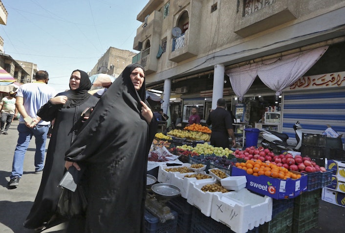 امرأة في سوق الصدرية في بغداد، العراق، 10 سبتمبر/أيلول 2021 (الصورة عبر غيتي إيماجز)