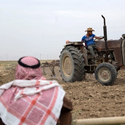 A farmer ploughs the land on the outskirts of Tel Kaif, Iraq on Oct. 26, 2021. (Photo via Getty Images)