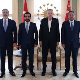Turkish spy chief Hakan Fidan, Iraqi Parliament Speaker Mohammed Al-Halbousi and Turkish President Recep Tayyip Erdogan meet in Istanbul on Feb. 26, 2022. (Source: Mohammed Al-Halbousi/Twitter)