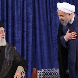Iranian Supreme Leader Ali Khamenei and former president Hassan Rouhani during a ceremony in Tehran, Iran on Aug. 3, 2017. (Photo via Iran’s supreme leader website)