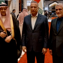 Iraq's then prime minister (C) hosts Saudi Arabia's intelligence chief (L) and the deputy secretary of Iran's Supreme National Security Council (R) in Baghdad on Apr. 21, 2022. (Photo via Nour News)