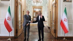 Iranian Deputy Foreign Minister Ali Baqeri-Kani meets EU deputy foreign policy chief Enrique Mora in Tehran on May 13, 2022. (Handout by Iranian foreign ministry)