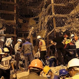 Rescuers continue to search for bodies under the rubble of the Metropol building in Abadan on May 27, 2022. (Photo via Tasnim News Agency)