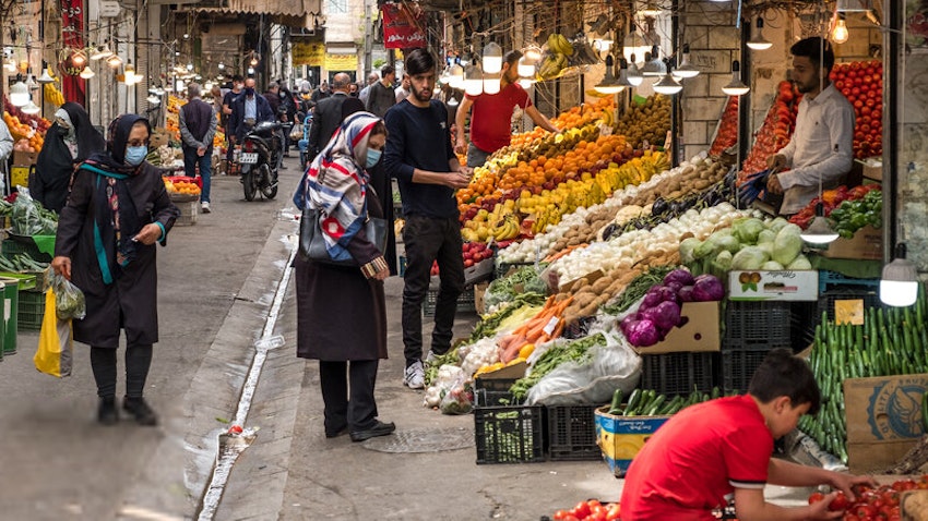 Iranians shop at a local bazar in Tehran, Iran on Apr. 6, 2021. (Photo by Majid Khahi via ISNA)