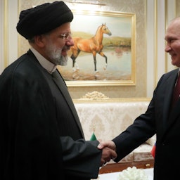 Iranian President Ebrahim Raisi meets his Russian counterpart Vladimir Putin  in Ashqabat, Turkmenistan on June 29, 2022. (Photo via Iranian presidency)