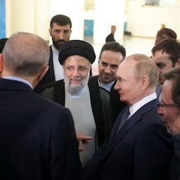Iranian President Ebrahim Raisi hosts his Russian and Turkish counterparts for a trilateral summit in Tehran on July 19, 2022. (Photo via Iranian presidency)