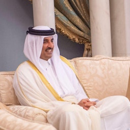 Bahrain's King meets Qatar's Emir on the sidelines of the Security and Development Summit in Jeddah, Saudi Arabia on July 16, 2022. (Handout photo via BNA)