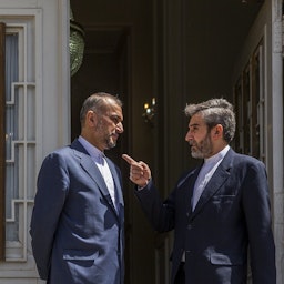 Iranian Foreign Minister Hossein Amir-Abdollahian and Iran's chief nuclear negotiator Ali Baqeri-Kani speak in Tehran, Iran on June 23, 2022. (Photo via IRNA)