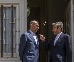 Iranian Foreign Minister Hossein Amir-Abdollahian and Iran's chief nuclear negotiator Ali Baqeri-Kani speak in Tehran, Iran on June 23, 2022. (Photo via IRNA)