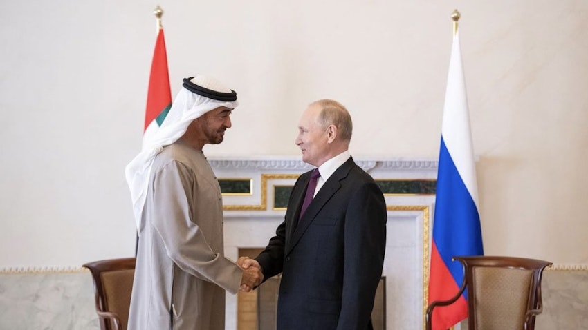 The UAE's President and Abu Dhabi's ruler Sheikh Mohammed bin Zayed Al Nahyan (L) meets Russian Federation President Vladimir Putin (R) in St. Petersburg on Oct. 11, 2022. (Handout photo via WAM)