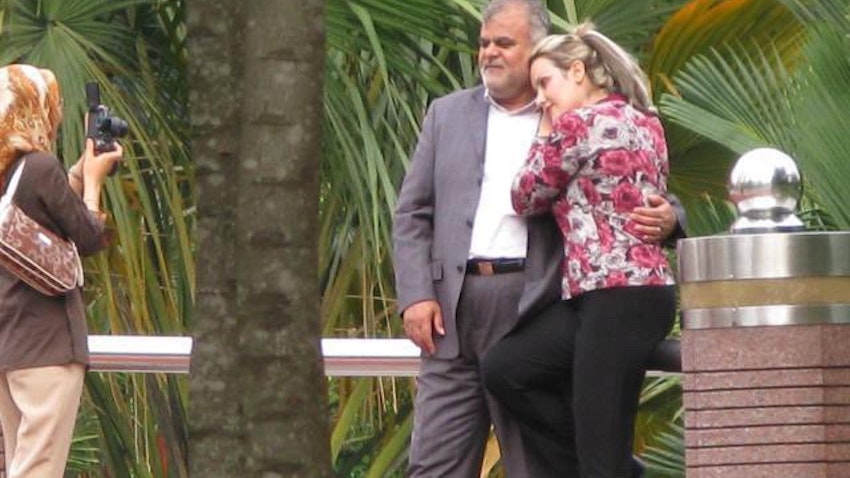 Leaked photo showing then-oil minister, Rostam Qasemi, posing for a picture with a female companion in Malaysia in 2011. (Source: Shahed Alavi/Twitter)