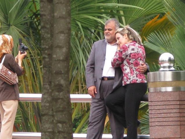 Leaked photo showing then-oil minister, Rostam Qasemi, posing for a picture with a female companion in Malaysia in 2011. (Source: Shahed Alavi/Twitter)