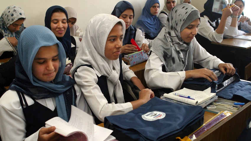 Students from the Hala Bint Khuwaylid secondary girl's school in  Baghdad, Iraq in 2003. (Photo via USAID)
