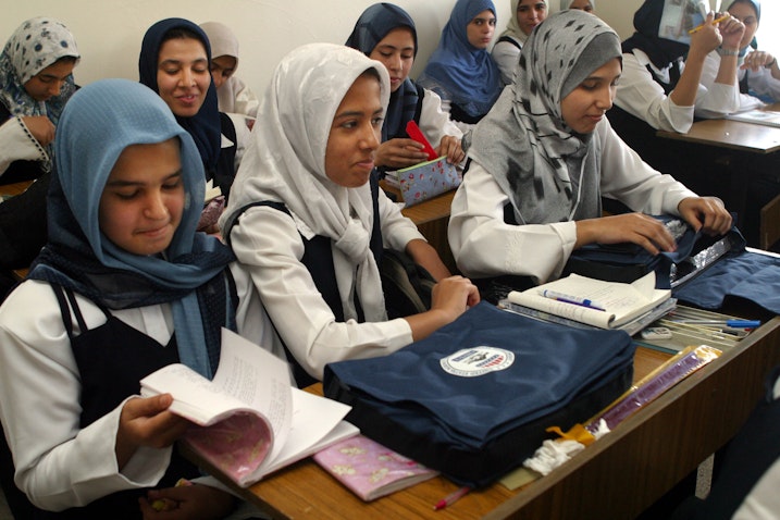 Students from the Hala Bint Khuwaylid secondary girl's school in  Baghdad, Iraq in 2003. (Photo via USAID)