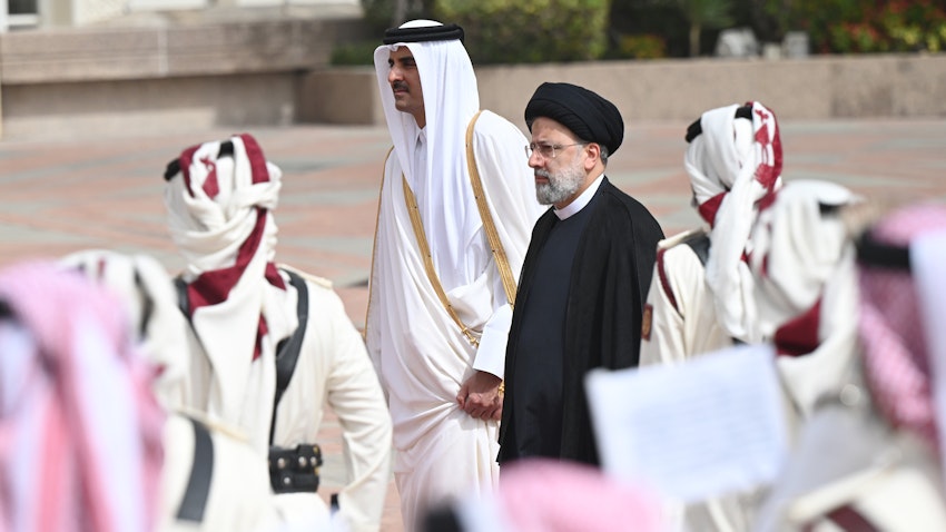 Emir of Qatar Sheikh Tamim bin Hamad Al Thani receives Iranian President Ebrahim Raisi in Doha, Qatar on Feb. 21, 2022. (Handout photo via Qatari Amiri Diwan)