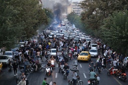Demonstrators take to the streets during a protest for Mahsa Jina Amini in Tehran, Iran on Sept. 21, 2022. (Photo via Getty Images)