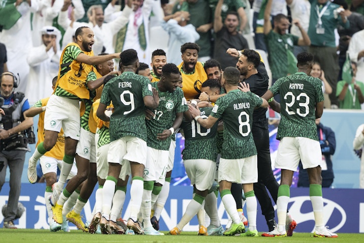 Saudi players celebrate win against Argentina in the World Cup in Lusail City, Qatar on Nov. 22, 2022. (Photo via Getty Images)