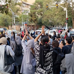 Iranians take to the streets to protest the death of Mahsa Amini in Tehran, Iran on Sept. 19, 2022. (Photo via Getty Images)