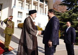 Iranian President Ebrahim Raisi welcomes Prime Minister of Iraq Muhammad Shia’ Al-Sudani during his visit to Tehran, Iran on Nov. 29, 2022. (Source: IraqiPMO/Twitter)