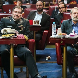 Secretary of Iran’s Supreme National Security Council Ali Shamkhani and former parliament speaker Ali Larijani in Tehran, Iran. Date unspecified. (Photo via Azad News Agency)