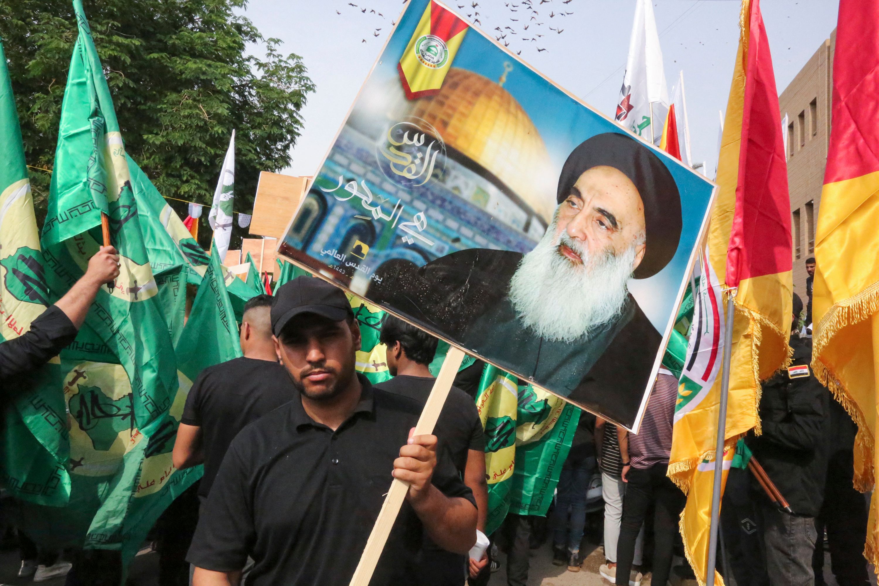 Iraq's top Shiite cleric slams use of his portrait as debate on PMU's  future heats up