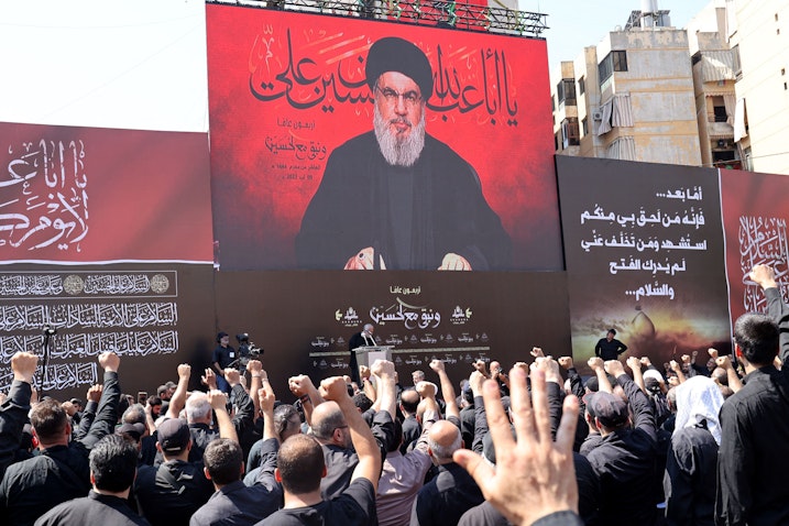 Supporters of the Lebanese Shiite movement Hezbollah react to a speech by Hassan Nasrallah in Beirut, Lebanon on Aug. 9, 2022. (Photo via Getty Images)