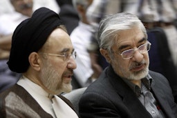 Former president Mohammad Khatami and oppostion leader Mir Hossein Mousavi attend  the memorial service for Seifollah Dad in Tehran, Iran on July 31, 2009. (Photo via Getty Images)