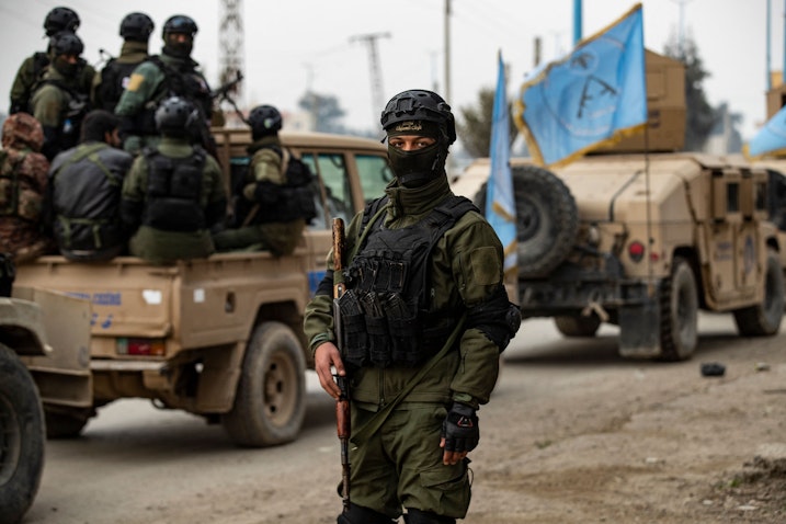 Syrian Kurdish Asayish security forces deploy during a raid against suspected Islamic State group fighters in Raqqa, Syria on Jan. 28, 2023. (Photo via Getty Images)