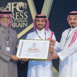 Saudi Minister of Sports Abdulaziz bin Turki Al-Faisal celebrates Saudi Arabia's winning bid to host the 2027 AFC Asian Cup in Manama, Bahrain on Feb. 1, 2023. (Photo via Saudi Arabian Football Federation)