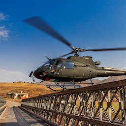 A helicopter lands on a bridge in the Kurdistan Region of Iraq. Exact location and date unknown. (Photo by Wolf-Dieter Grabner via Wikimedia Commons)
