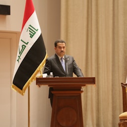 Iraqi Prime Minister Muhammad Shia’ Al-Sudani addresses the parliament in Baghdad, Iraq on Oct. 27, 2022. (Photo via Getty Images)