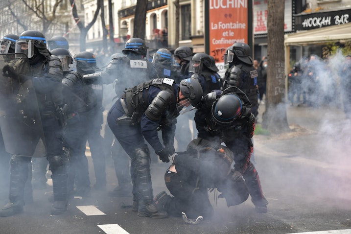 Riot police arrest a protester during clashes in a demonstration against the government in Paris, France on Mar. 23, 2023. (Photo via Getty Images)