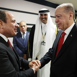 Turkish President Recep Tayyip Erdogan shakes hands with President of Egypt Abdel Fattah el-Sisi in Doha, Qatar on Nov. 20, 2022. (Photo via Getty Images)