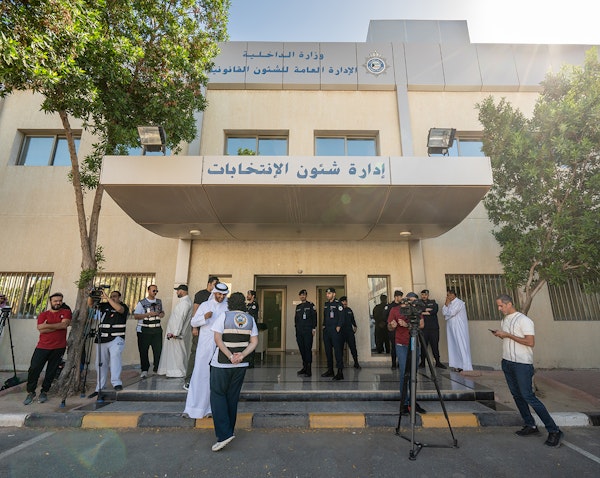 Crowds gather outside the elections affairs administration building in Kuwait City on May 5, 2023. (Handout photo via KUNA)
