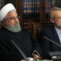 Iran’s former president Hassan Rouhani and ex-parliament speaker Ali Larijani at a meeting of the Supreme Council of Cultural Revolution in Tehran on May, 8, 2019. (Photo via Iranian presidency's website)