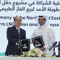 Energy Minister Saad bin Sherida Al-Kaabi and China National Petroleum Corporation Chairman Dai Houliang sign a deal in Doha, Qatar on June 20, 2023. (Photo via Getty Images)