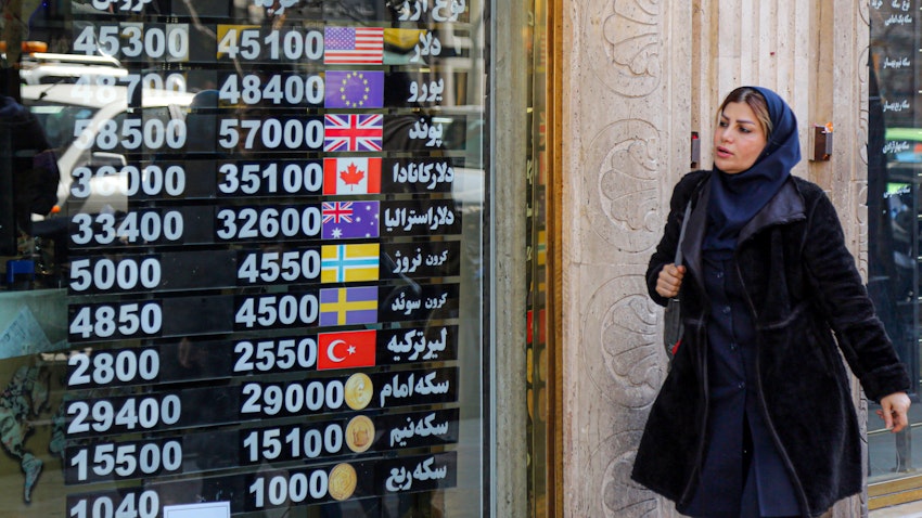 Currency rates displayed at an exchange office in Tehran, Iran on Feb. 22, 2023. (Photo via Getty Images)