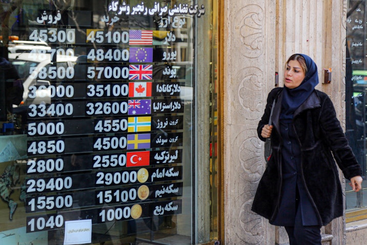 Currency rates displayed at an exchange office in Tehran, Iran on Feb. 22, 2023. (Photo via Getty Images)