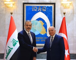 Turkish Foreign Minister Hakan Fidan meets with his Iraqi counterpart Fuad Hussein in Baghdad, Iraq on Aug. 22, 2023. (Photo via Getty Images)
